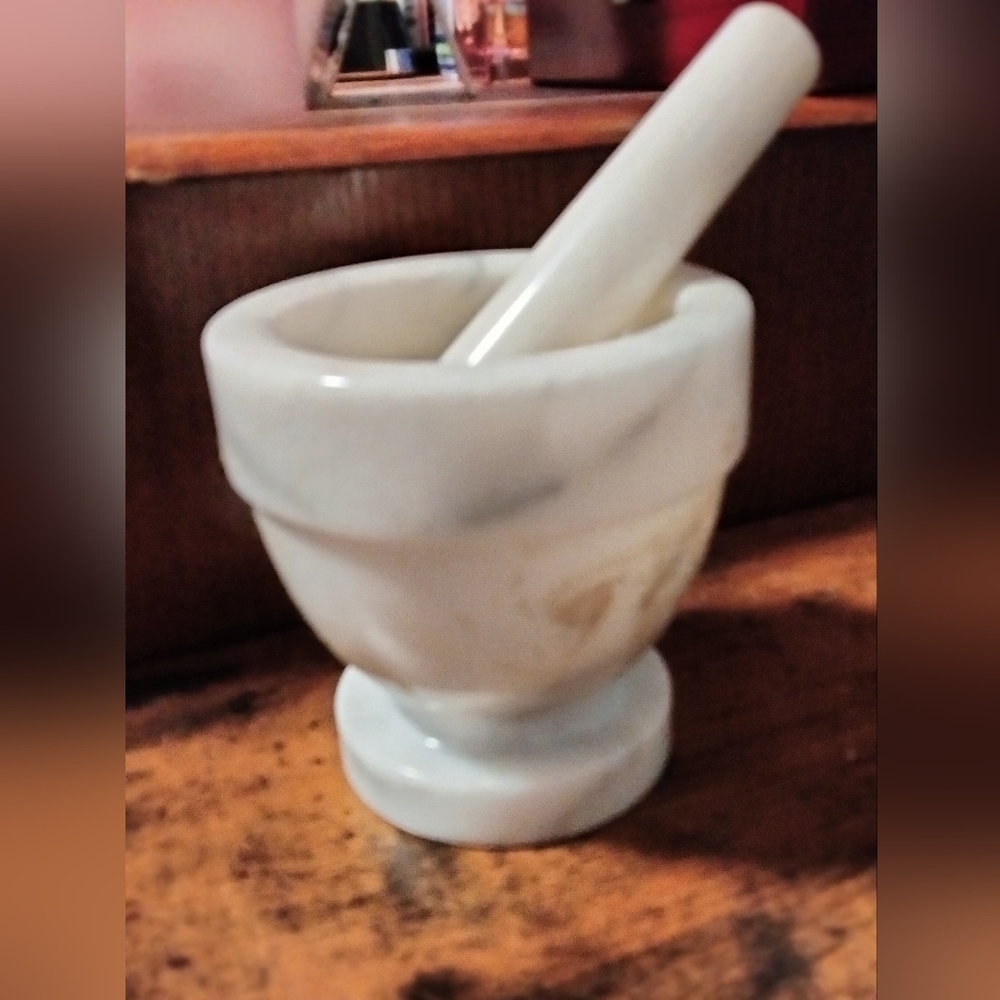 Marble mortar and pestle. Herbs, spices, cooking. Seasoning, decor, spells.